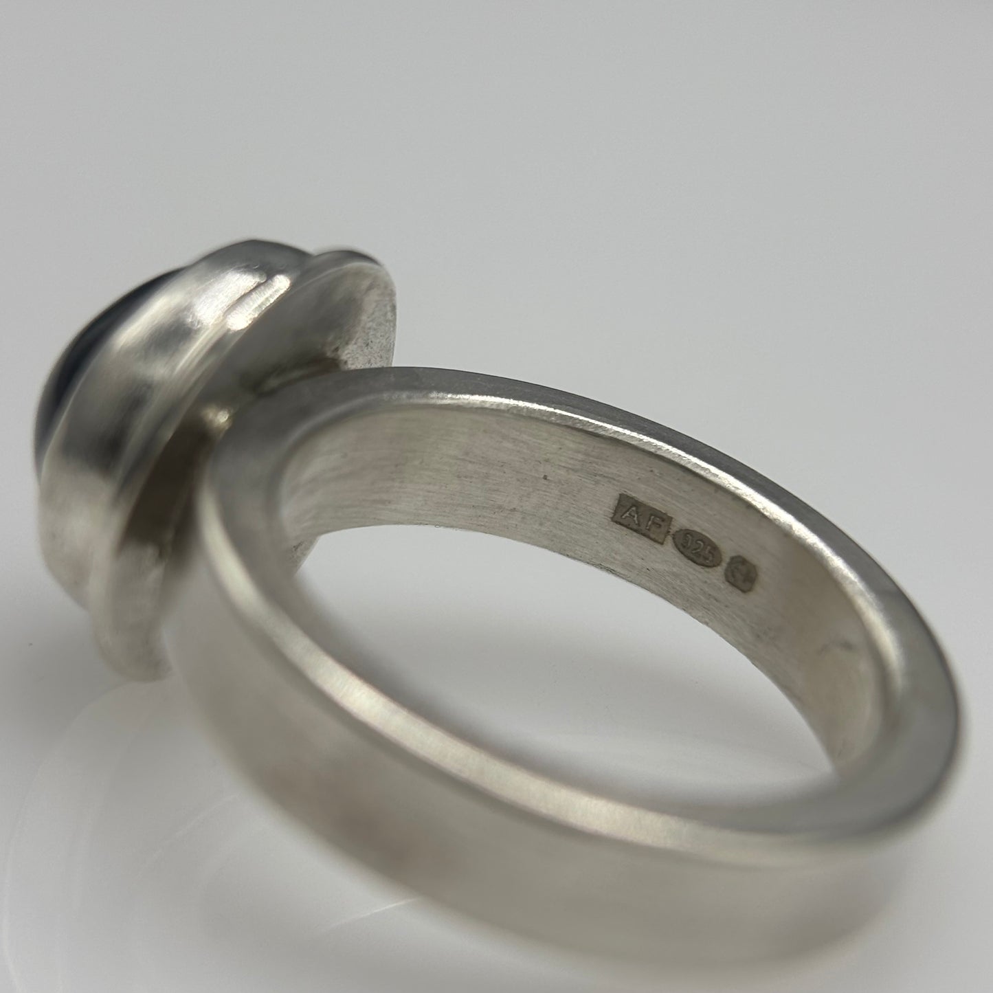 Anthony Feiler – Ring: Black Diopside in Stepped Silver Bezel