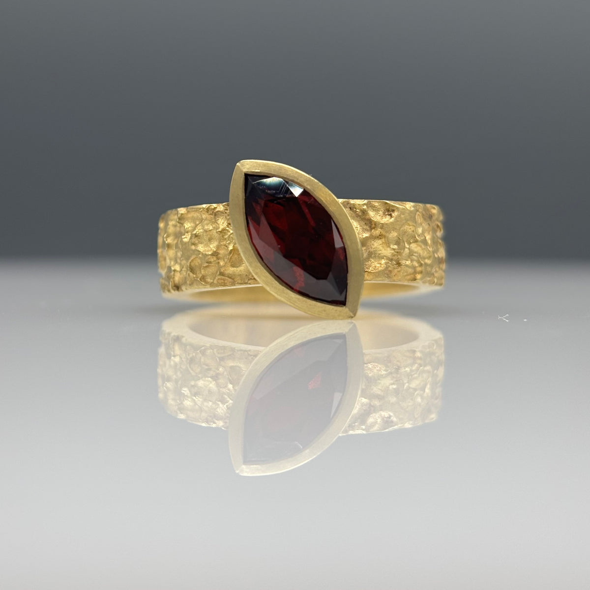 Susi Hines 18ct gold plated etched silver ring with marquis garnet