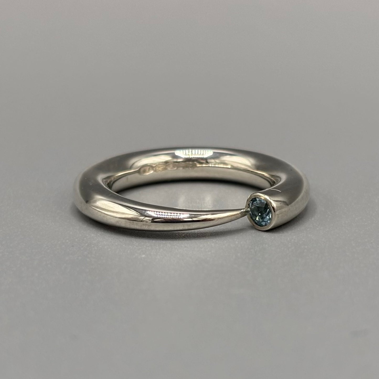 Paul Finch - Ring: 4mm tapering silver with blue topaz